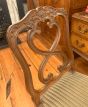 Antique wooden chair with fabric seat