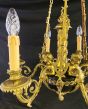 Stylish French gilded brass chandelier, supporting cherubs and 6 candles