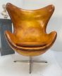 Pair of Iconic restored leather egg chairs