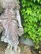 Stone spring maiden statue 
