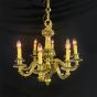 Decorative brass chandelier with cherub detailing 