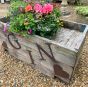 Wooden Gin metal sign garden planter on wheels 