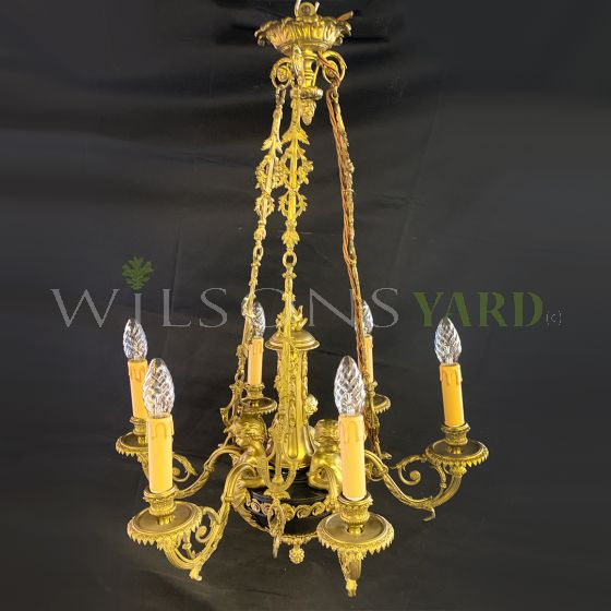 Stylish French gilded brass chandelier, supporting cherubs and 6 candles